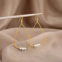 Golden Carole Pearl Dangler Earrings