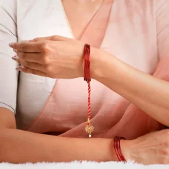 Golden Divya Swastik Lumba Rakhi
