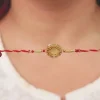 Golden Floral Om Rakhi