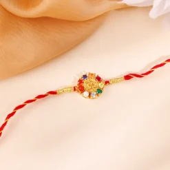 Golden Floral Om Rakhi