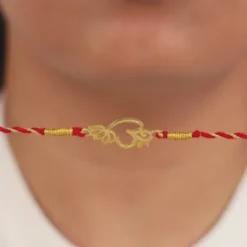 Golden Floral Omkara Rakhi