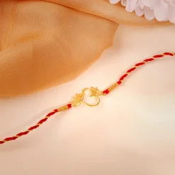 Golden Floral Omkara Rakhi