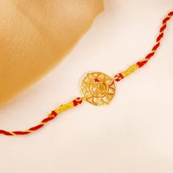 Golden Floret Omkara Rakhi