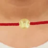 Golden Ganesha Blessing Rakhi