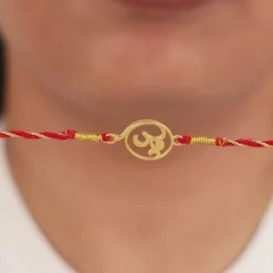 Golden Sacred Bloom Rakhi Combo (Set of 2)