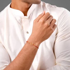 Golden Sacred Bloom Rakhi Combo (Set of 2)
