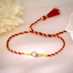 Golden Sphere Zircon Rakhi