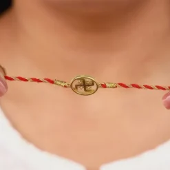 Golden Swastik Rakhi