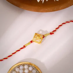 Golden Swastik Square Rakhi