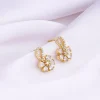Golden White Floral Damsel Earrings