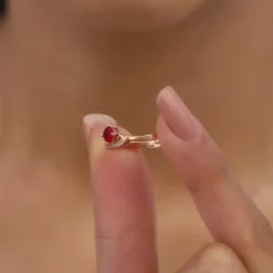 Rose Gold Embrace Of Red Ring