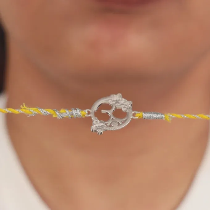 Silver Floral Omkara Rakhi