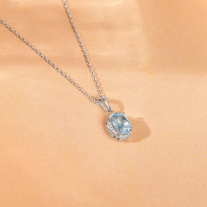 Silver Halo Blue Topaz Pendant With Link Chain