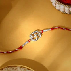 Silver Swastik In Square Rakhi